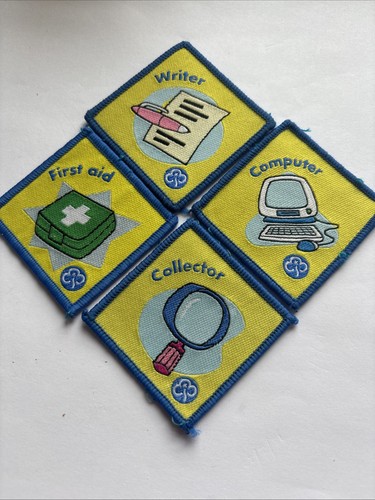 Four girl guide badges - guide,